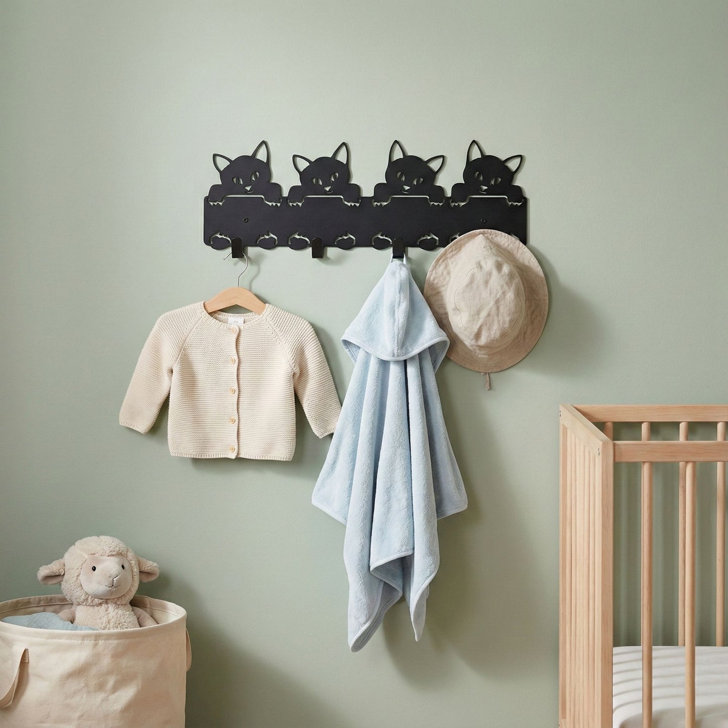 Metallinen seinänaulakko kissanpenut